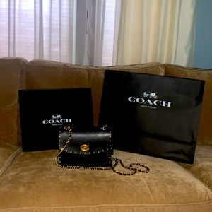 Coach leather cross body bag with brass detailing